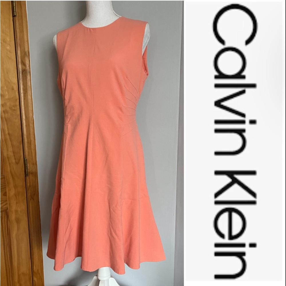 EUC Calvin Klein Ruched fit and flare dress in Peach size 10